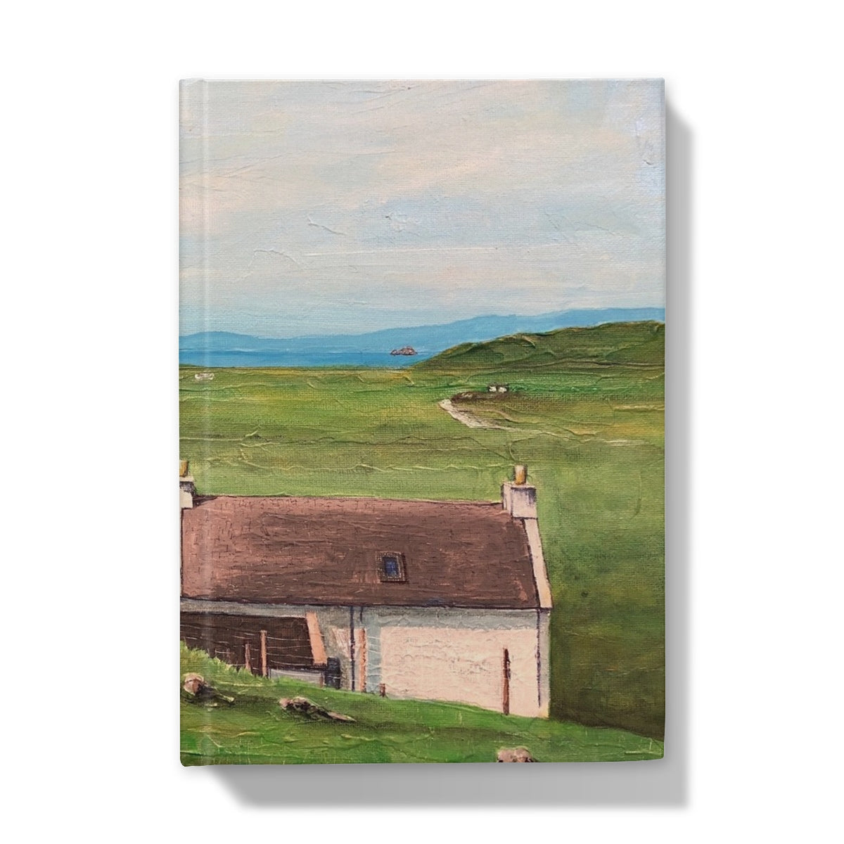 Painting of a rural landscape with a white cottage on the cover of A Skye Cottage Hardback Journal