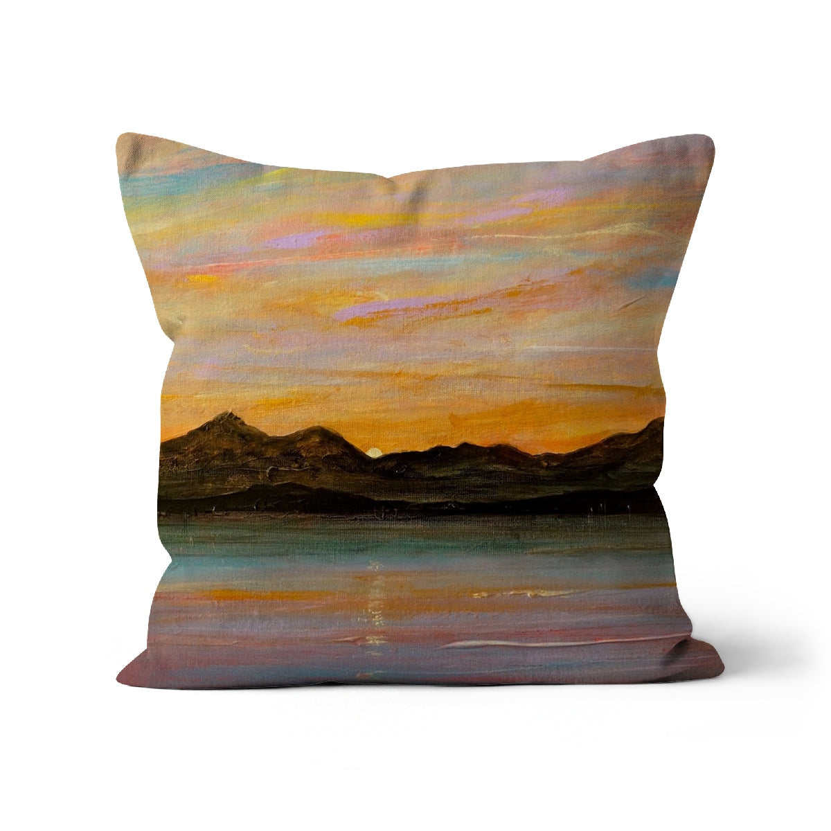Square throw pillow with painted sunset over mountains and lake in The Sleeping Warrior Arran Cushion