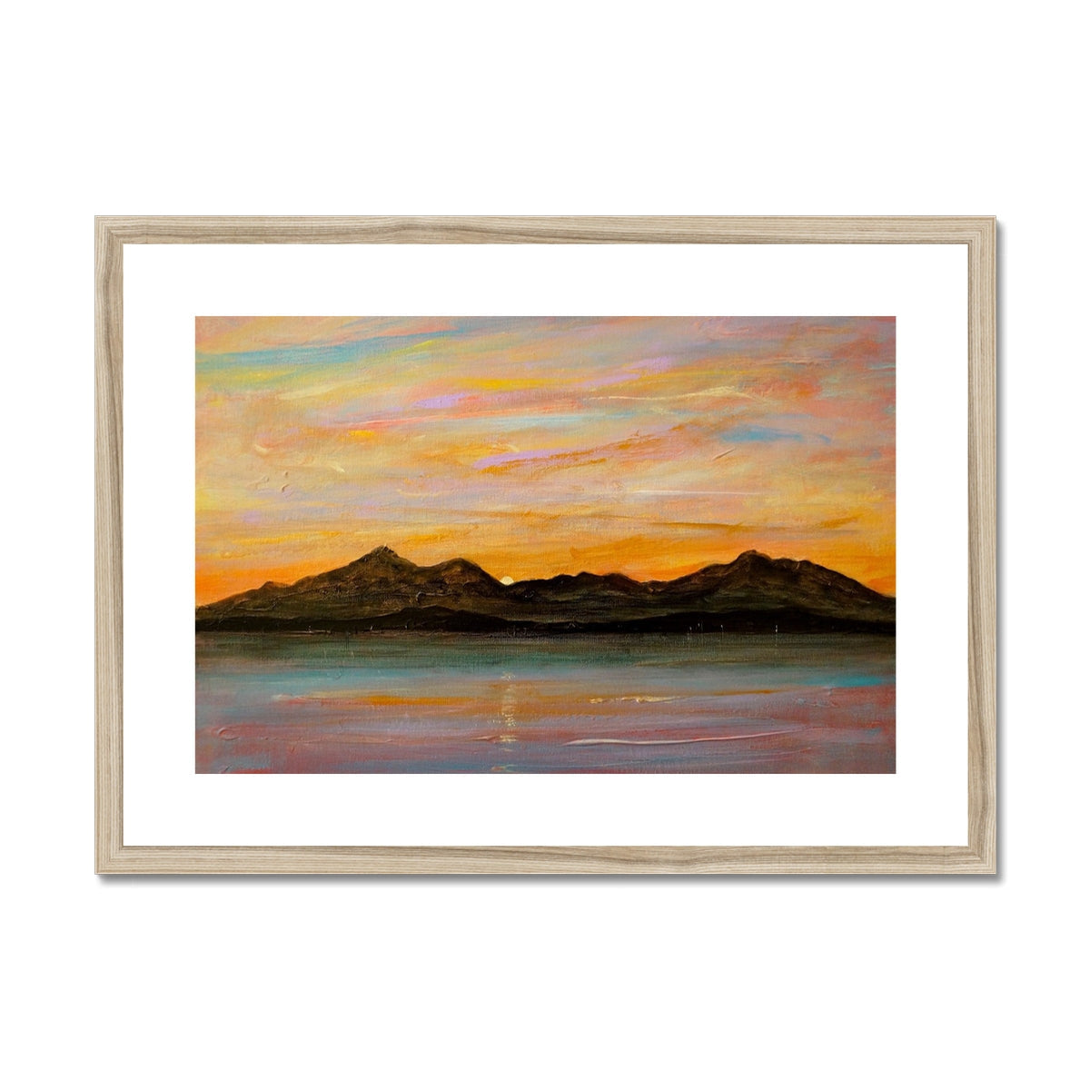 Framed landscape painting of mountains at sunset over water in The Sleeping Warrior Arran print