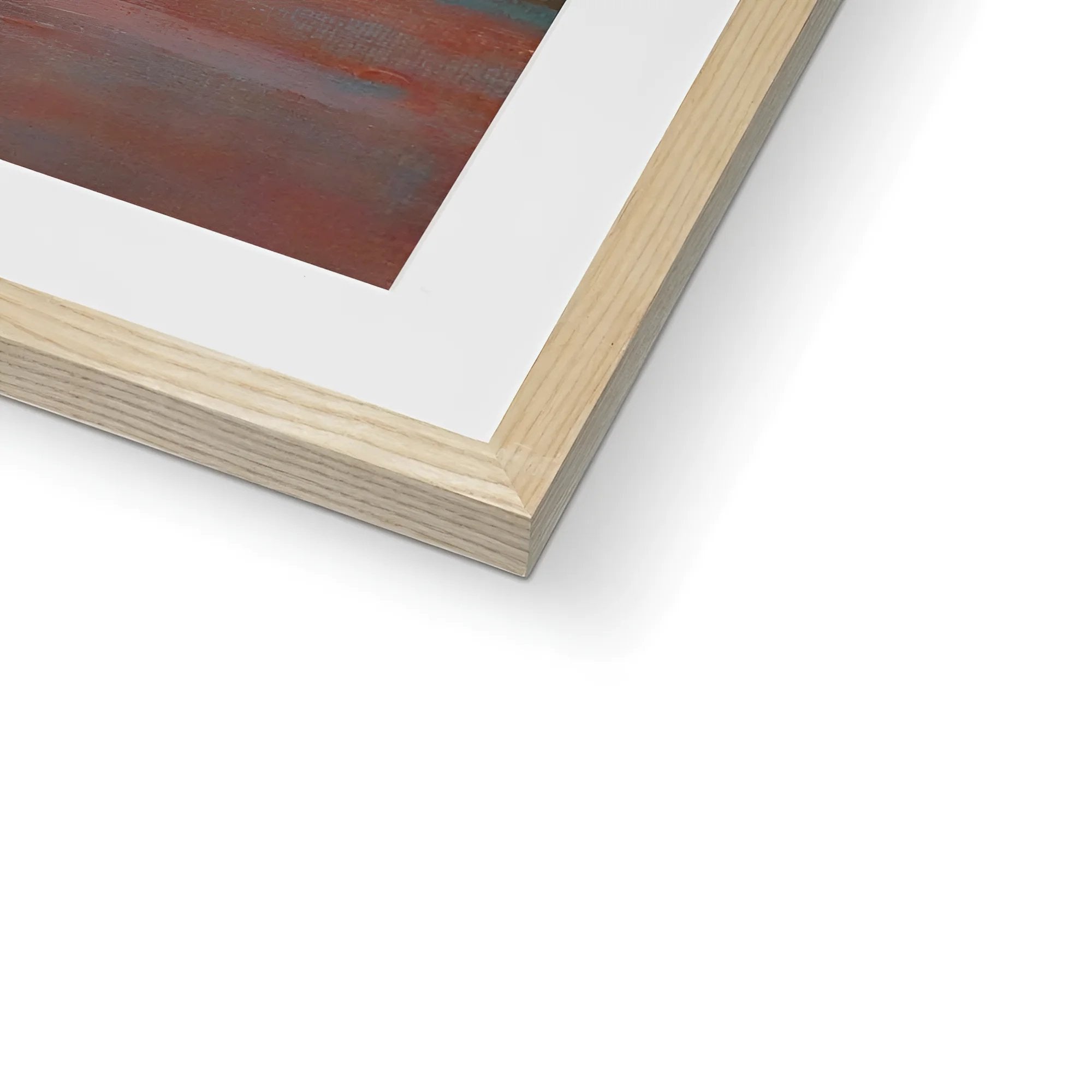 Light wooden frame with white mat showcasing artwork with red, brown, and blue shades