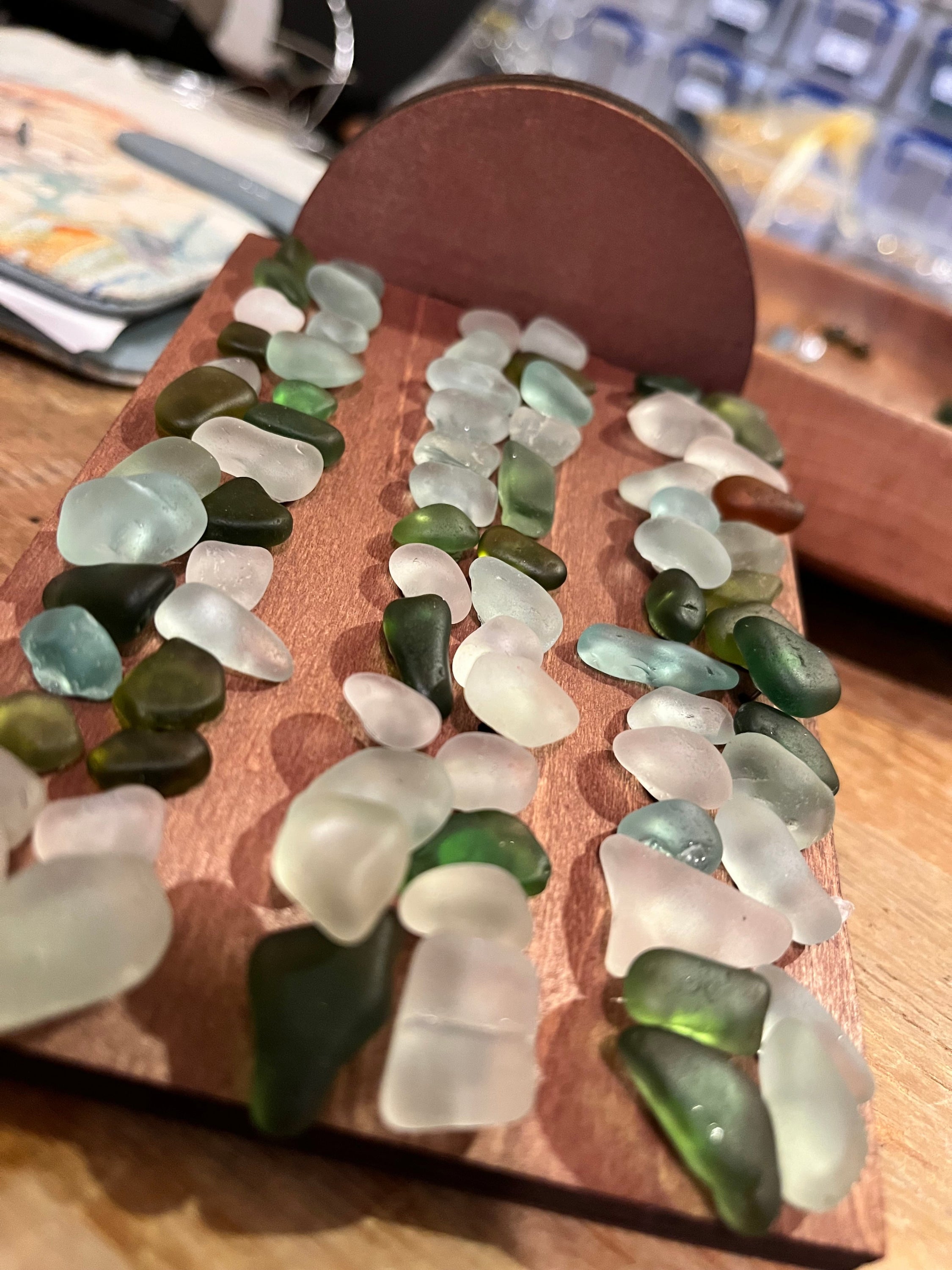 Wooden board decorated with multiple rows of colorful sea glass for Stainless Steel Studs