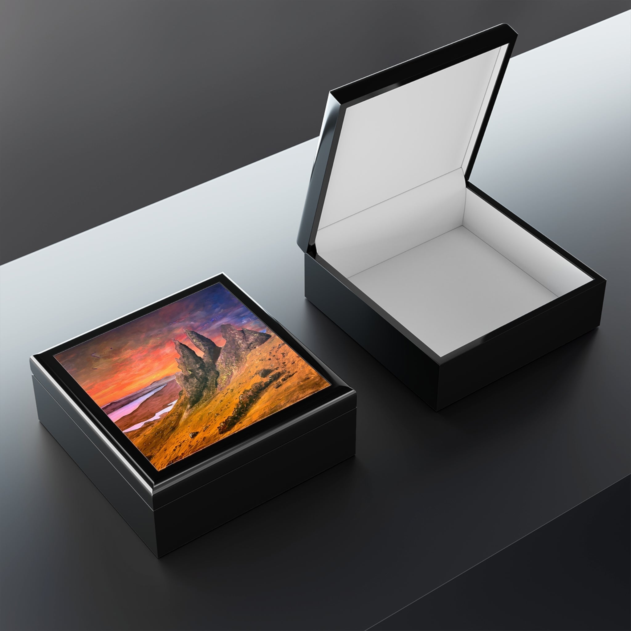 Storr Sunset Skye jewelry box with glossy black finish and rocky coastal sunset lid