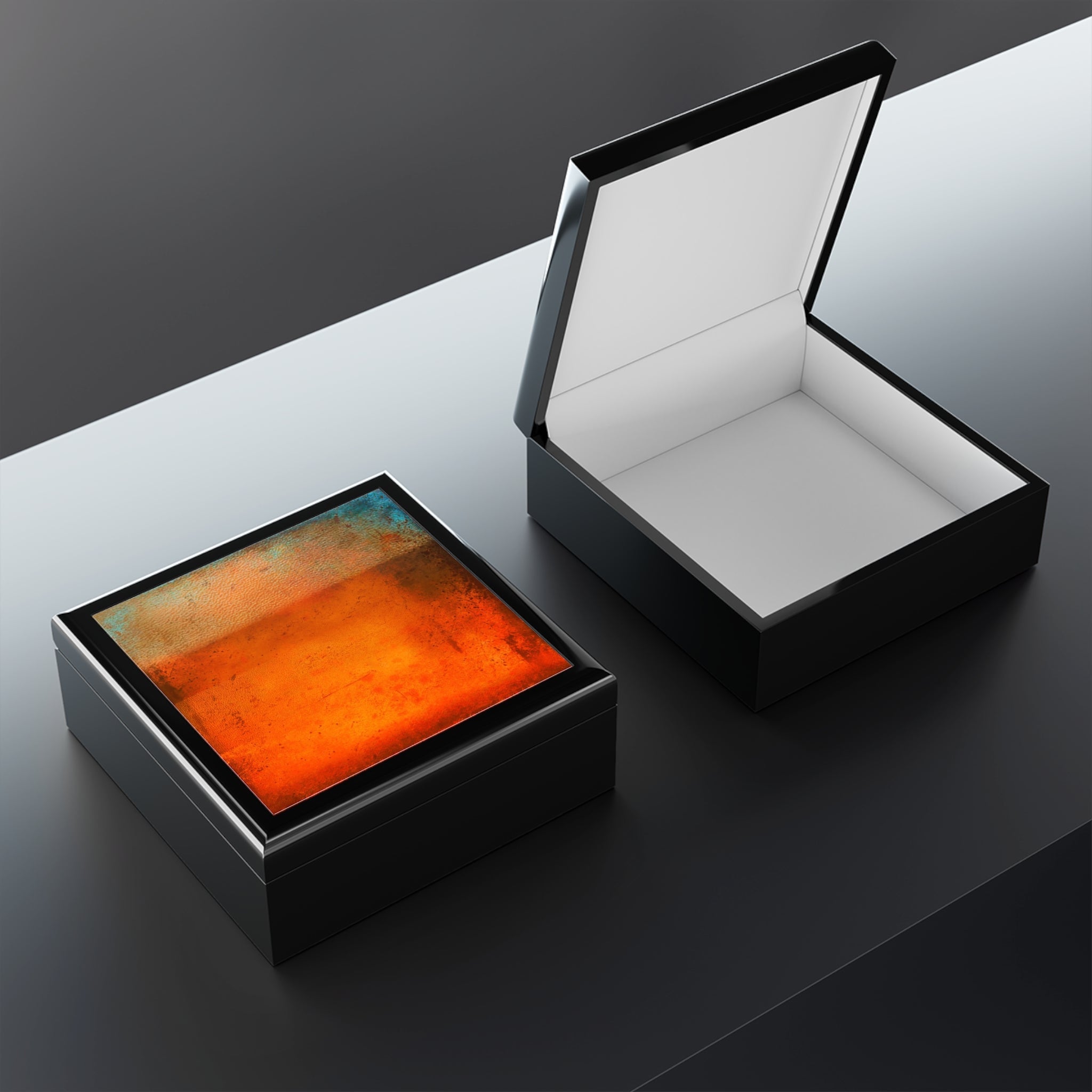 Black art jewellery boxes with abstract print and white interior for Sunset Horizon product