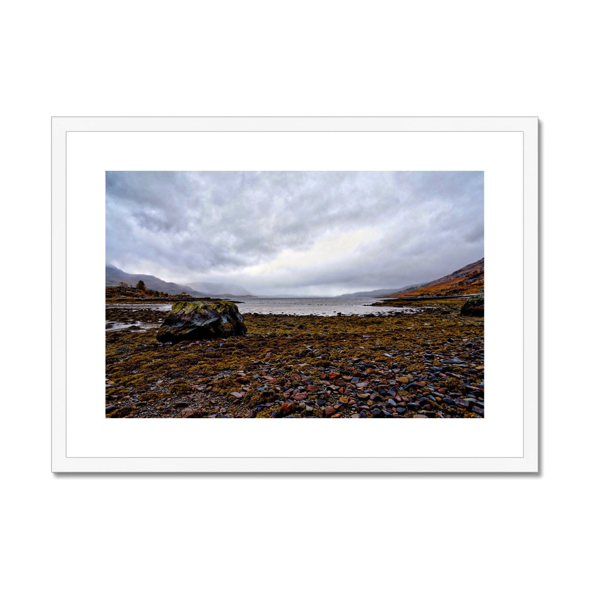 White framed Torridon coastal landscape canvas print with overcast sky and rocky shore