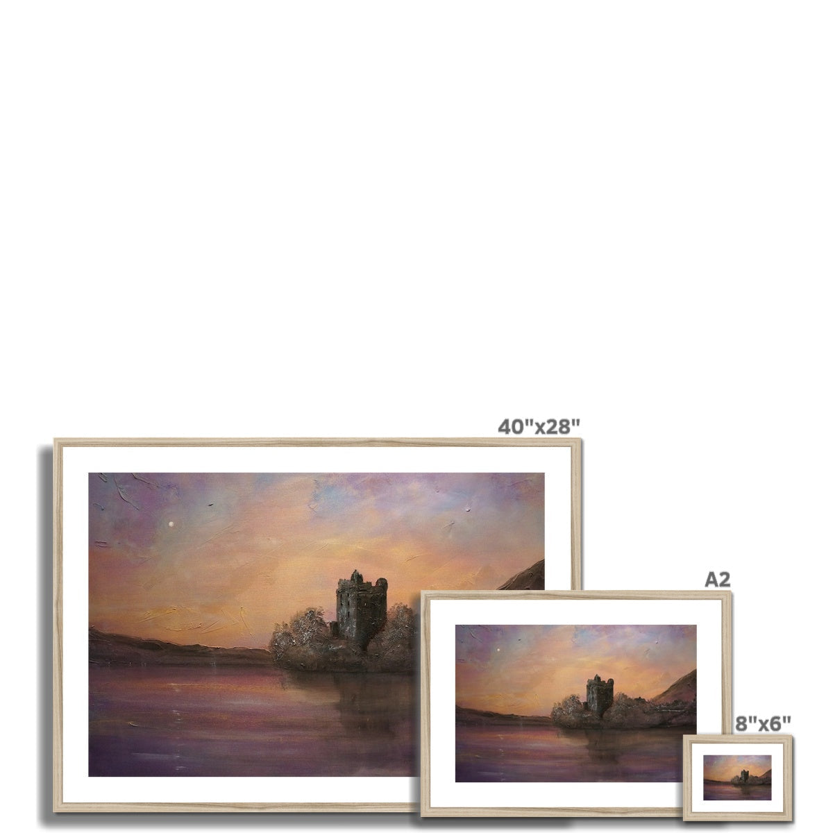Set of three framed landscape prints of Urquhart Castle by a lake at sunset