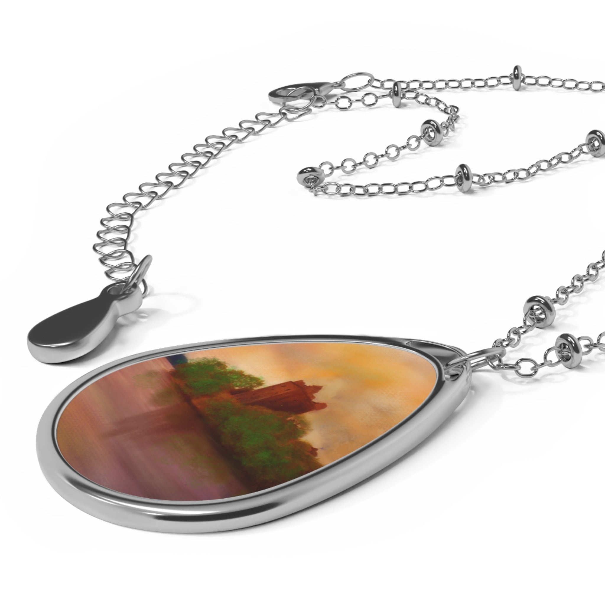 Silver-toned teardrop pendant necklace with abstract landscape design from Urquhart Castle Scottish Jewellery