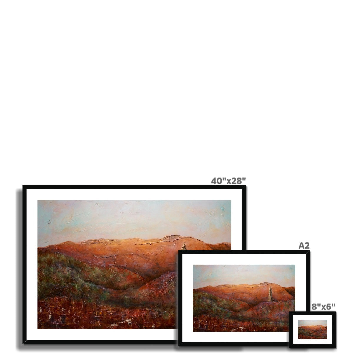 Three framed landscape prints of The Wallace Monument from Stirling Castle on display